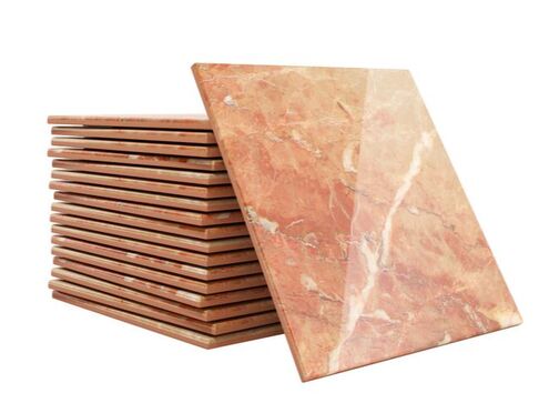 A stack of tan marble-look ceramic tile